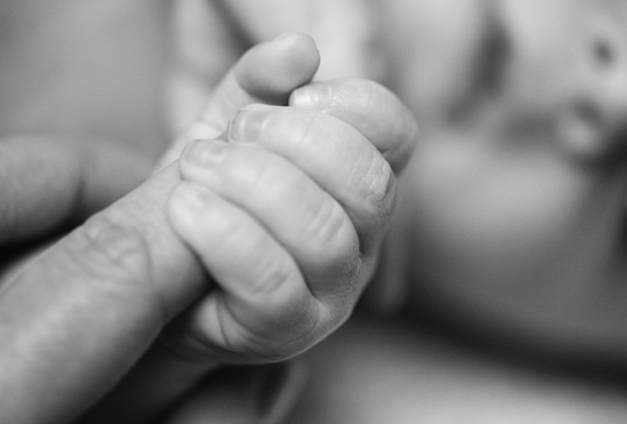 Baby photography Lifestyle portrait photograph of a baby